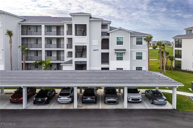 a view of a cafe with sitting area