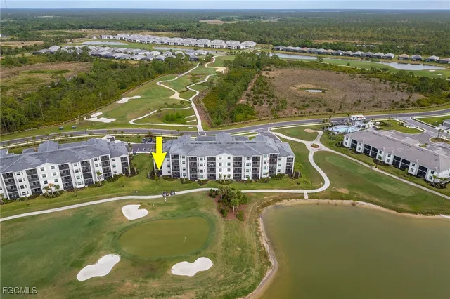 a view of a lake with a big yard