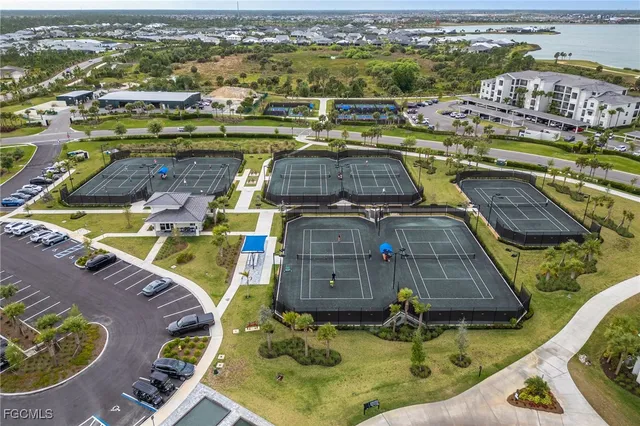 a aerial view of a pool table and chairs