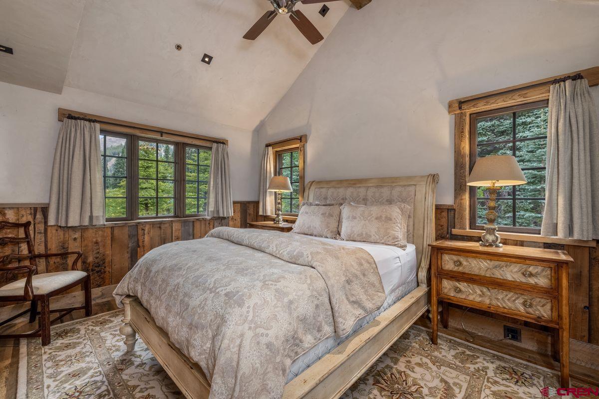 23 Gray Fox Lane Crested Butte, CO 81225 - Photo 38 of 45 a bed sitting in a bedroom next to a window