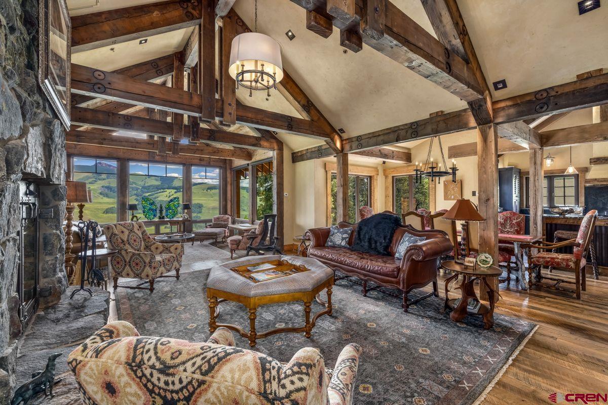 23 Gray Fox Lane Crested Butte, CO 81225 - Photo 8 of 45 a living room with lots of furniture and a large window