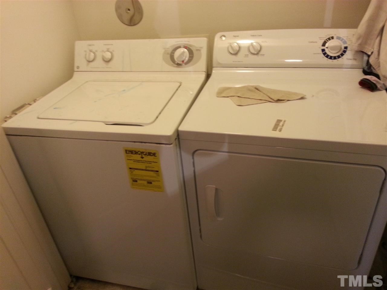 1305 Kent Road, Unit 102 Raleigh, NC 27606 - Photo 7 of 18 a close up view of washer and dryer