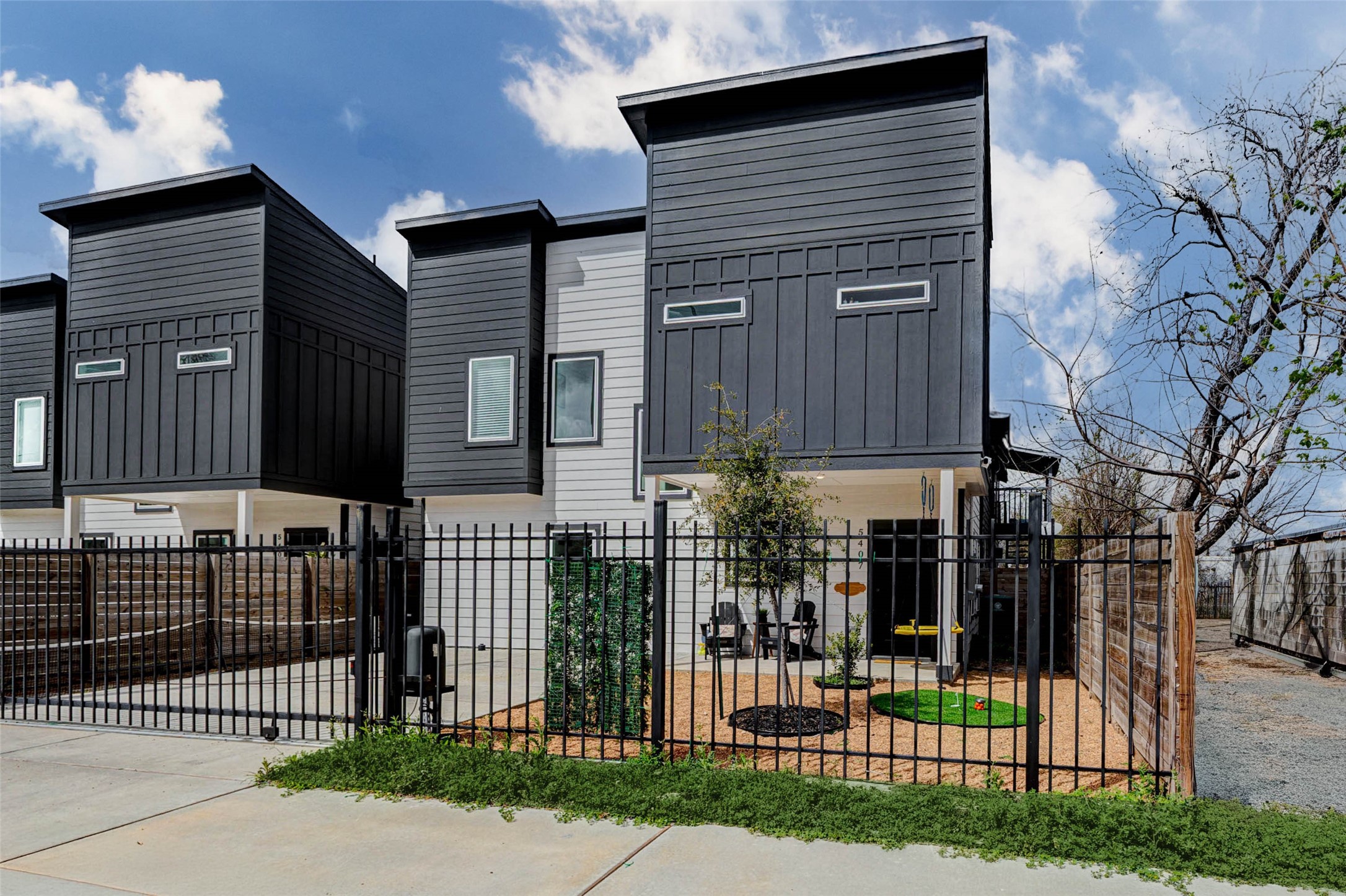 5407 Lee Street Houston, TX 77020 - Photo 14 of 17 This modern home offers seamless access and convenient parking, perfect for short or mid-term rental guests, ensuring a welcoming and hassle-free experience.