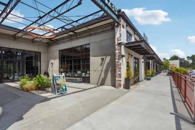 a view of a dinning table and chairs in patio