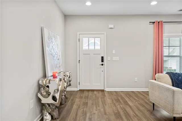 a room with furniture and flowers