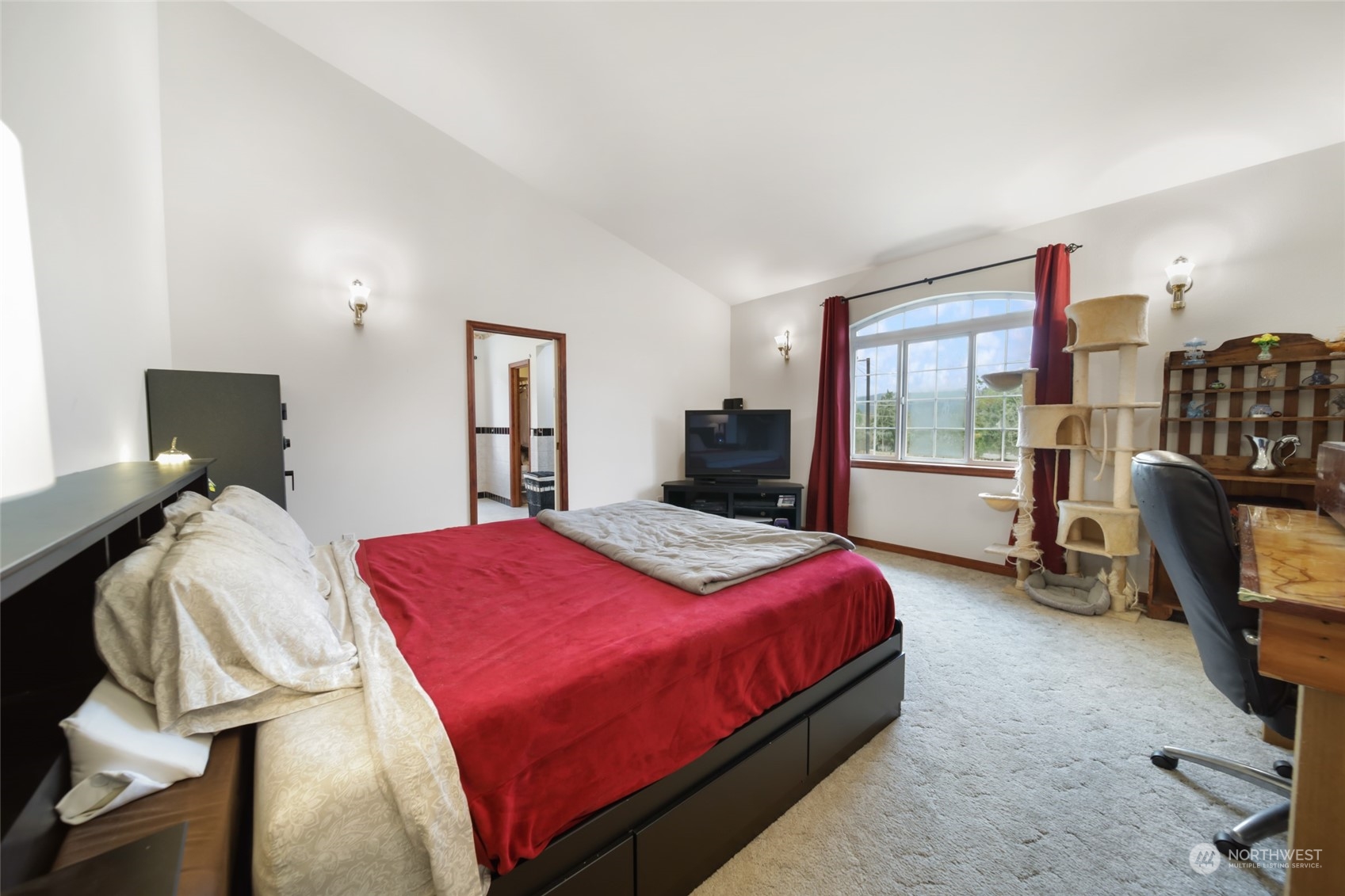 17141 Longmire Road Southeast Yelm, WA 98597 - Photo 11 of 29 a bedroom with a bed and a desk