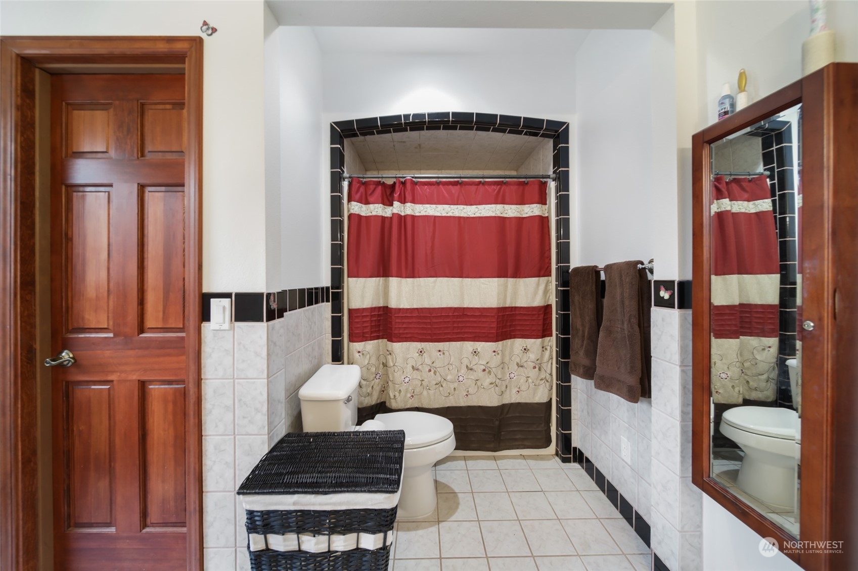 17141 Longmire Road Southeast Yelm, WA 98597 - Photo 14 of 29 a bathroom with a toilet and a shower
