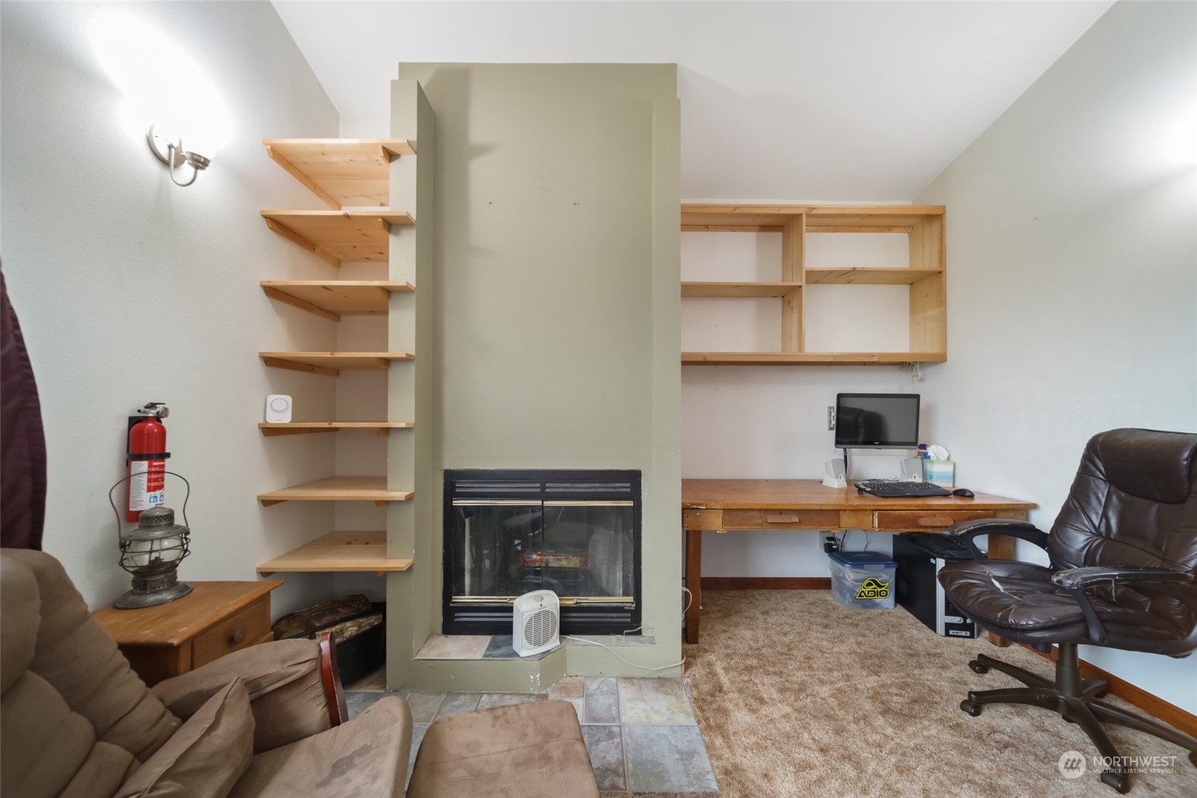 17141 Longmire Road Southeast Yelm, WA 98597 - Photo 20 of 29 a view of a workspace with furniture and a window
