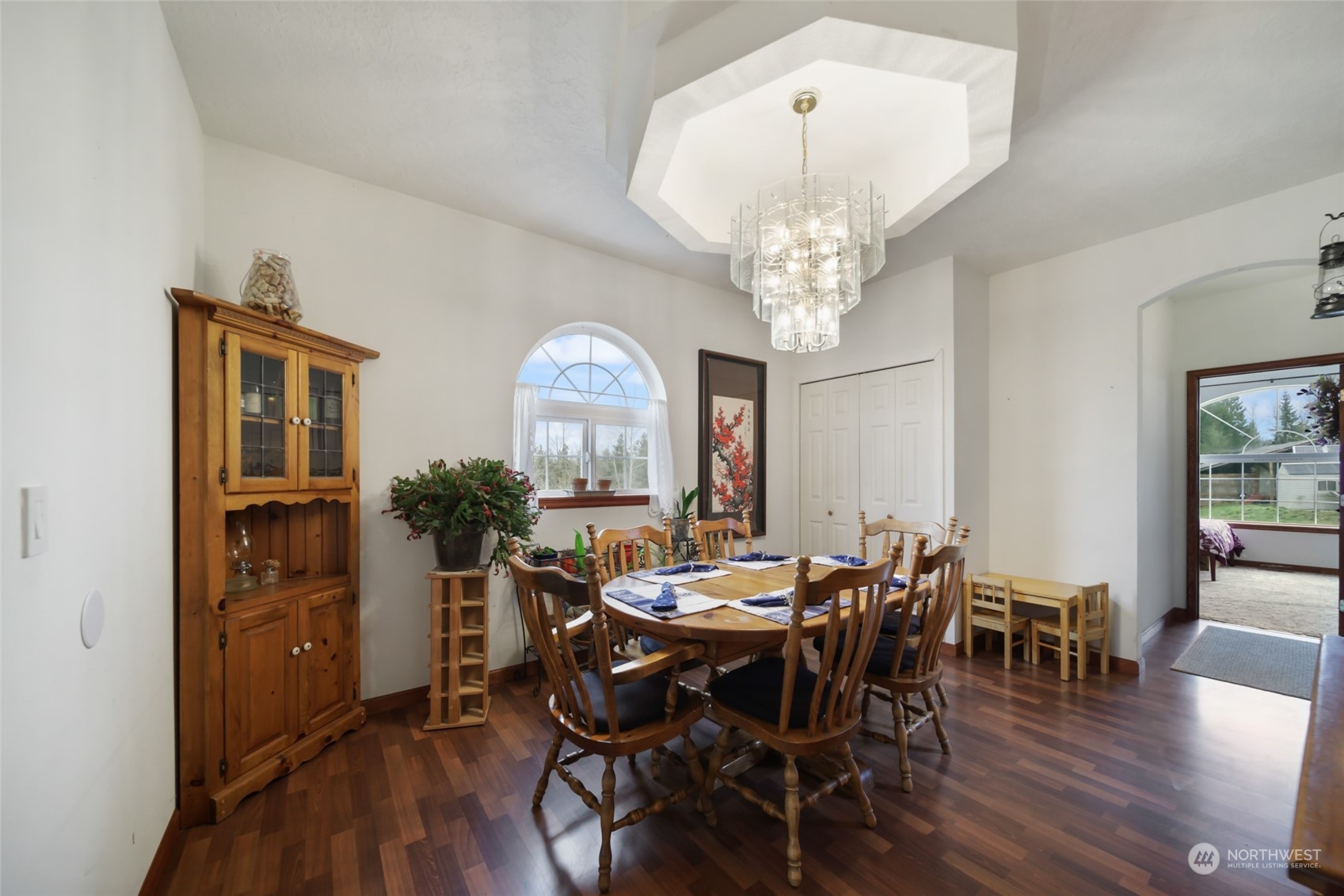 17141 Longmire Road Southeast Yelm, WA 98597 - Photo 21 of 29 a view of a dining room with furniture and wooden floor