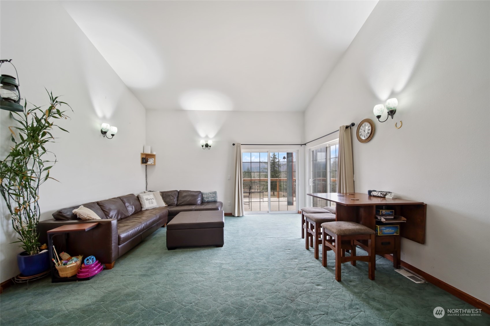 17141 Longmire Road Southeast Yelm, WA 98597 - Photo 6 of 29 a living room with furniture and wooden floor