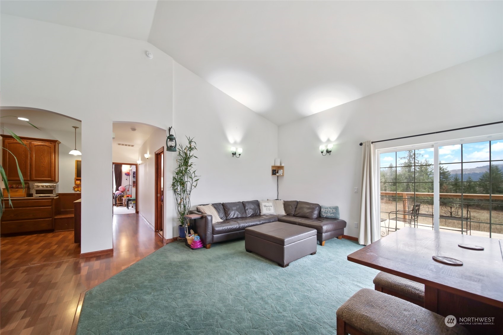 17141 Longmire Road Southeast Yelm, WA 98597 - Photo 7 of 29 a living room with furniture and a large window