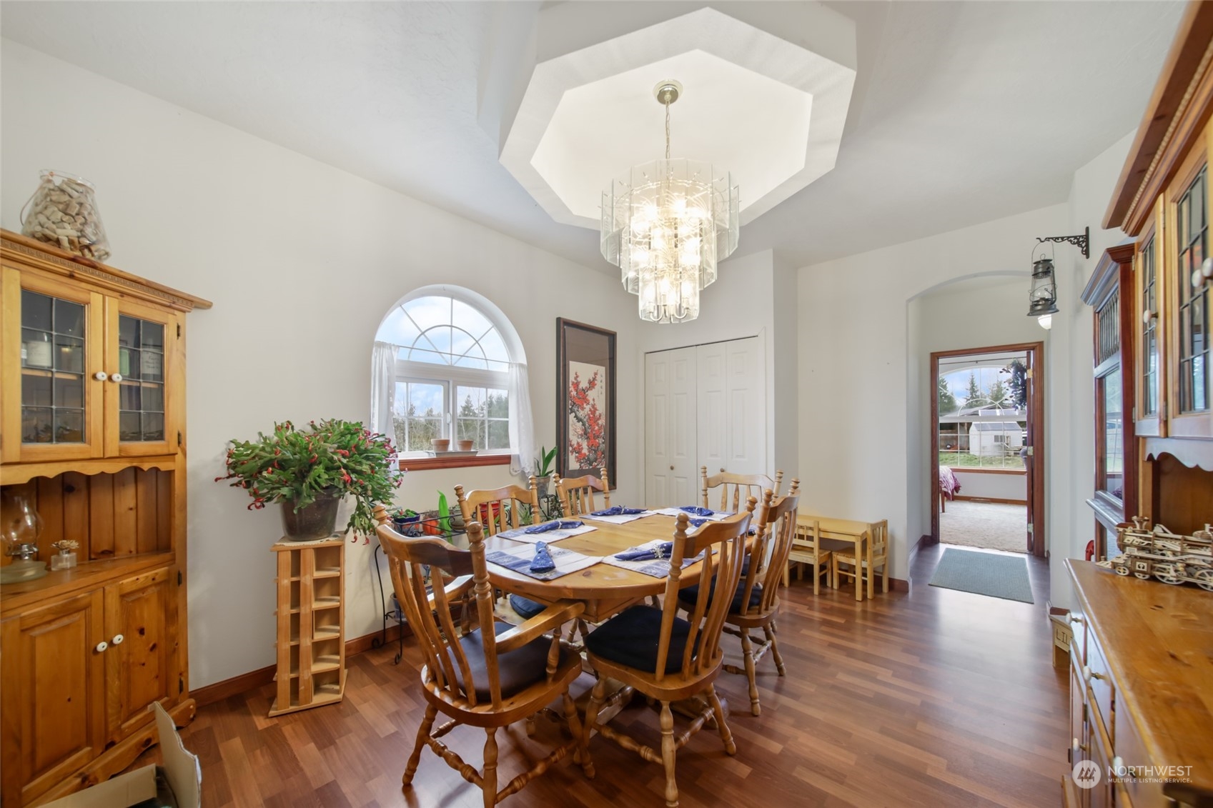 17141 Longmire Road Southeast Yelm, WA 98597 - Photo 9 of 29 a view of a dining room with furniture window and wooden floor