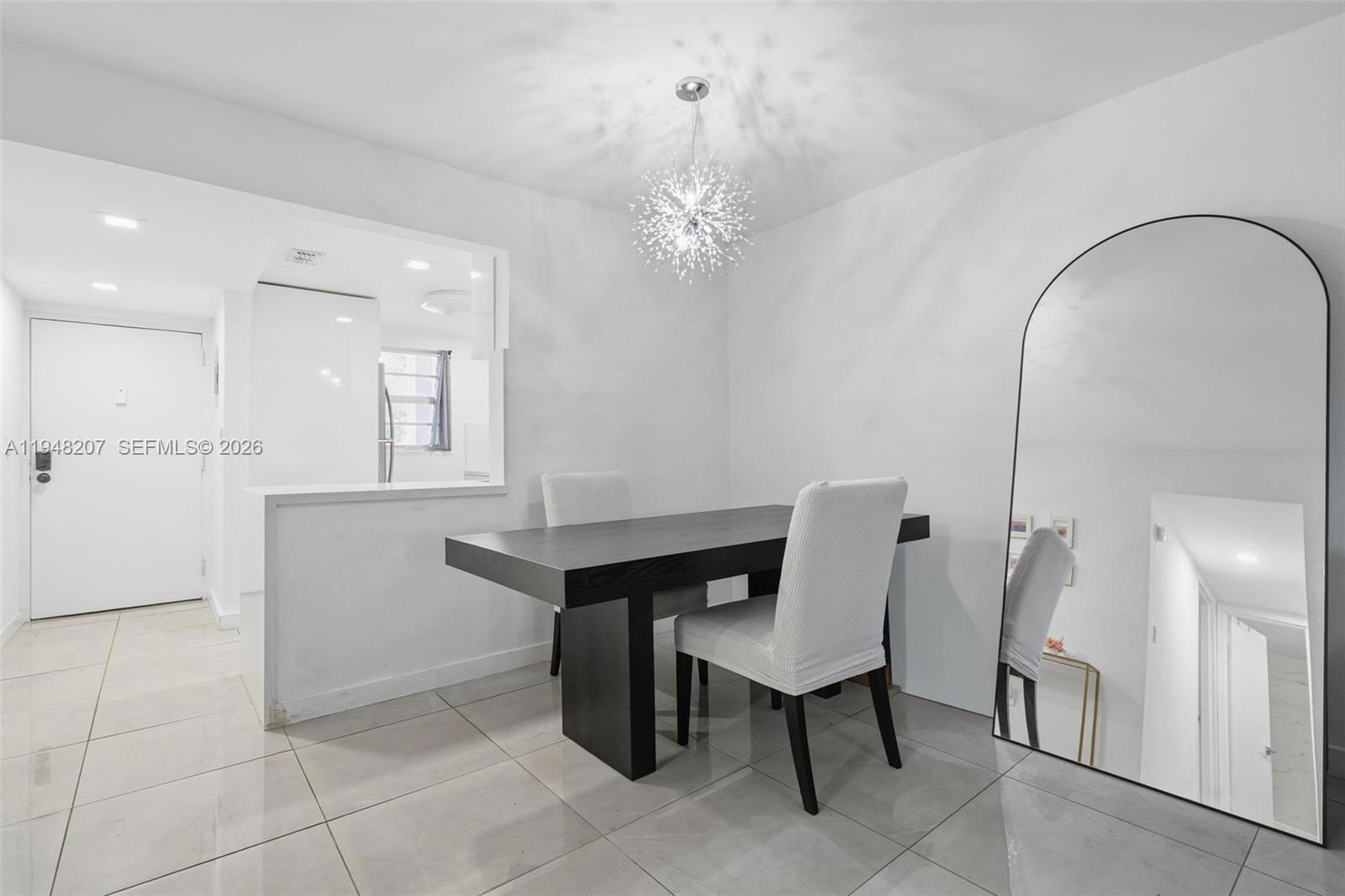 469 North Pine Island Road, Unit B302 Plantation, FL 33324 - Photo 12 of 33 a view of a dining room with furniture