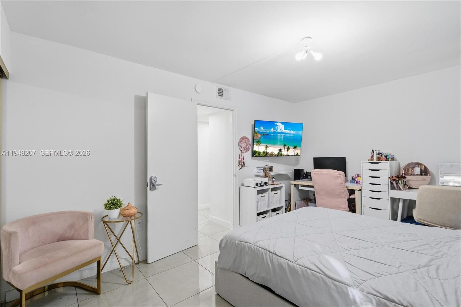 469 North Pine Island Road, Unit B302 Plantation, FL 33324 - Photo 28 of 33 a bedroom with a bed and a chair