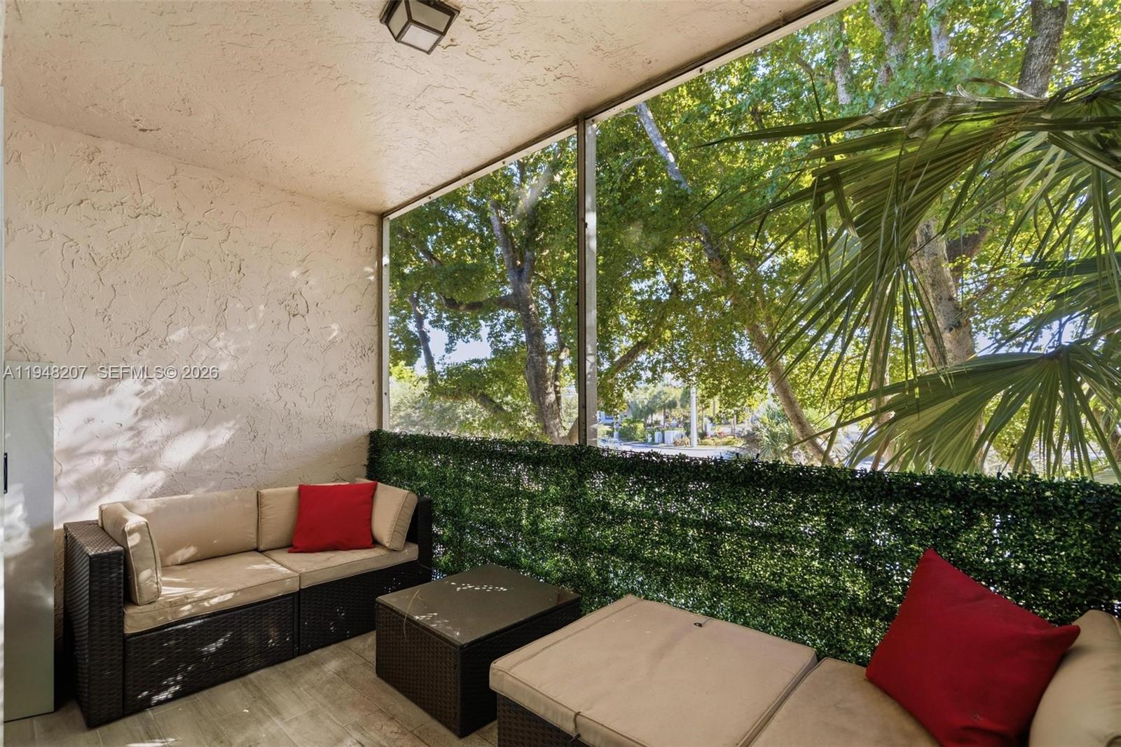 469 North Pine Island Road, Unit B302 Plantation, FL 33324 - Photo 32 of 33 a outdoor living space with furniture and garden view