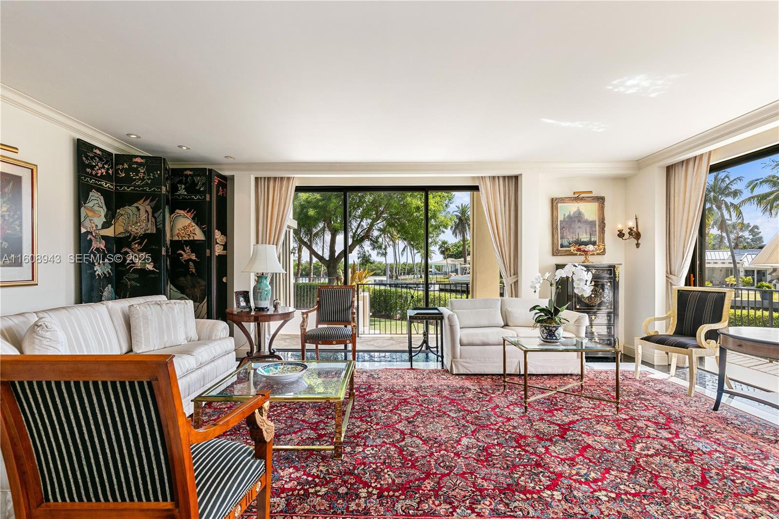 241 Cape Florida Drive Key Biscayne, FL 33149 - Photo 22 of 100 a living room with furniture and a large window