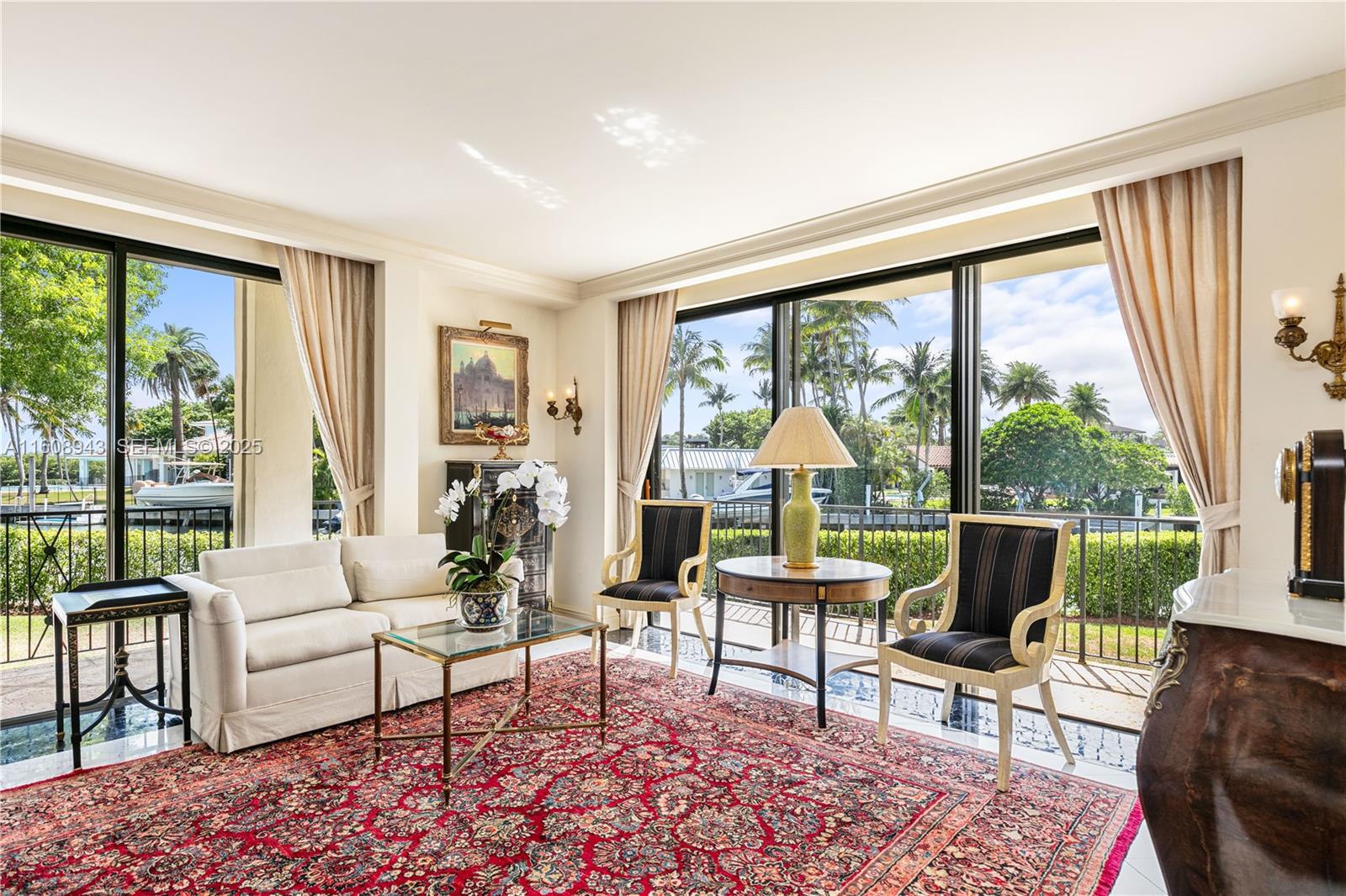 241 Cape Florida Drive Key Biscayne, FL 33149 - Photo 23 of 100 a living room with furniture and a large window
