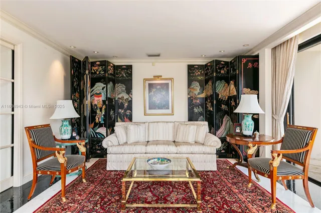 a front view of a house with a yard and potted plants