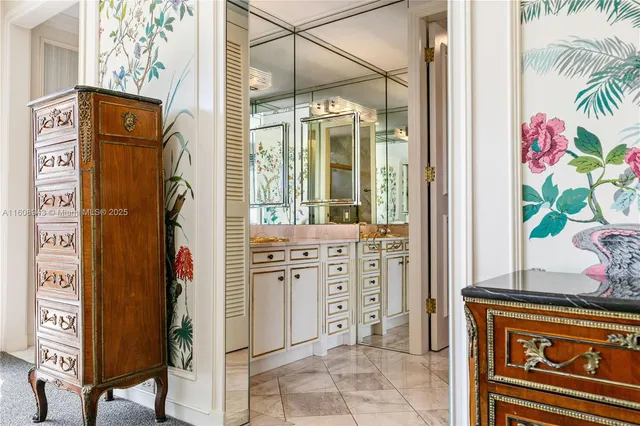 a view of a bedroom with furniture window and wooden floor