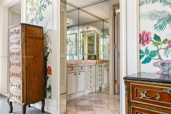 a bathroom with a toilet sink and shower