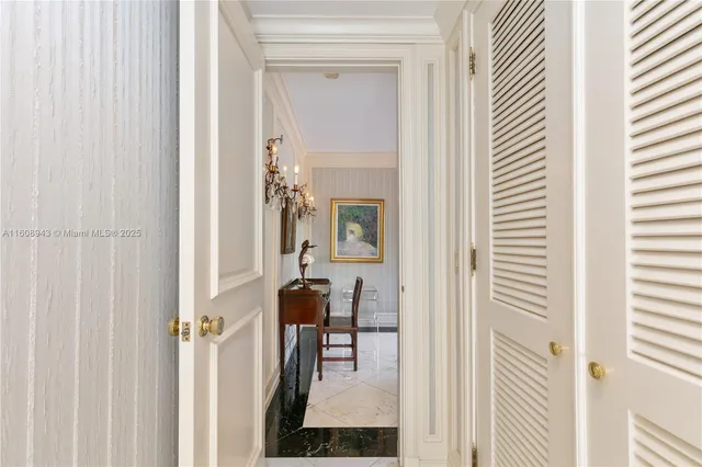 a spacious bedroom with a bed and cabinet