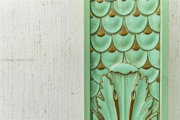 a room with gym equipment and a wooden floor