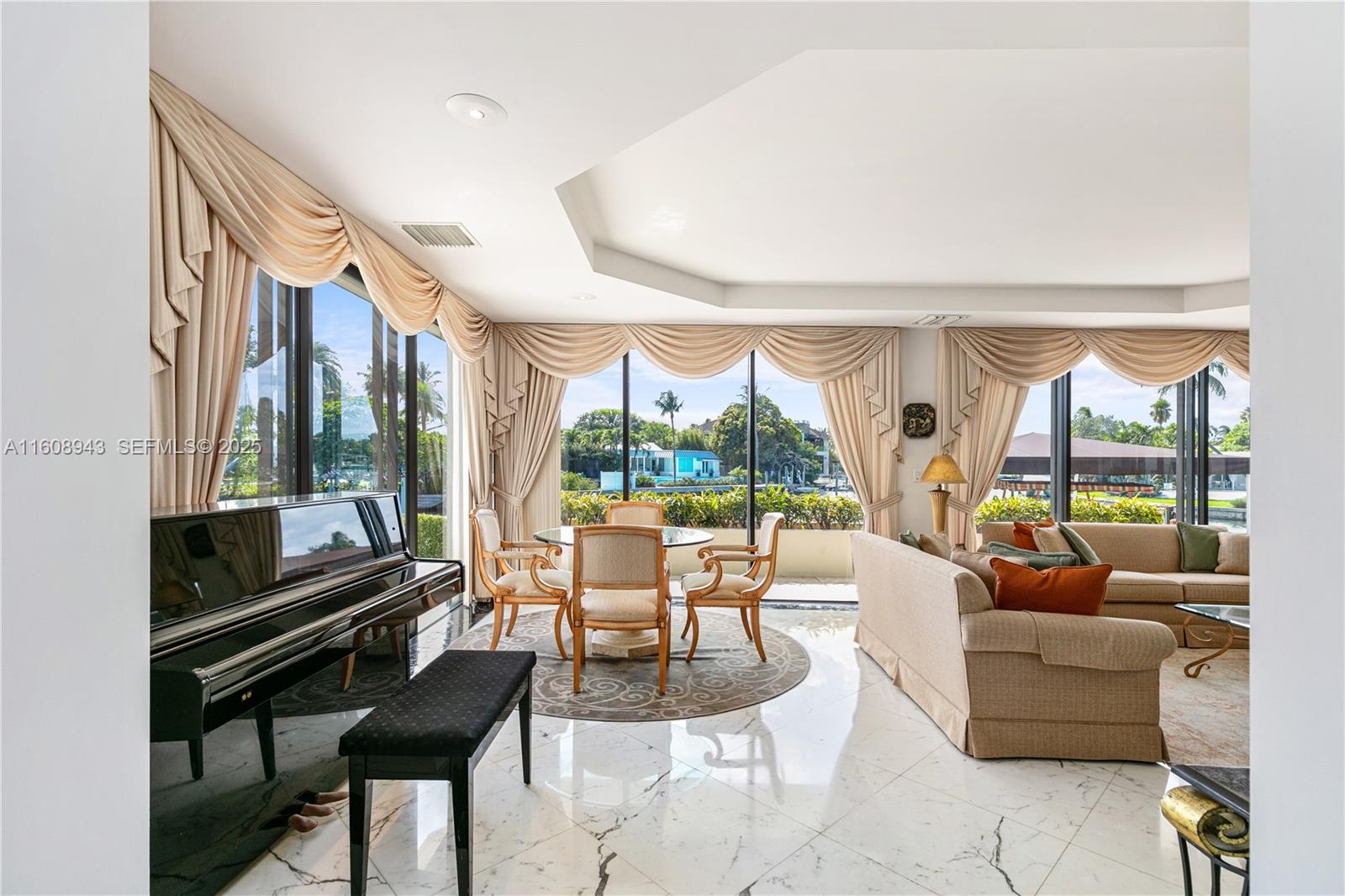 241 Cape Florida Drive Key Biscayne, FL 33149 - Photo 37 of 100 a living room with furniture and a large window
