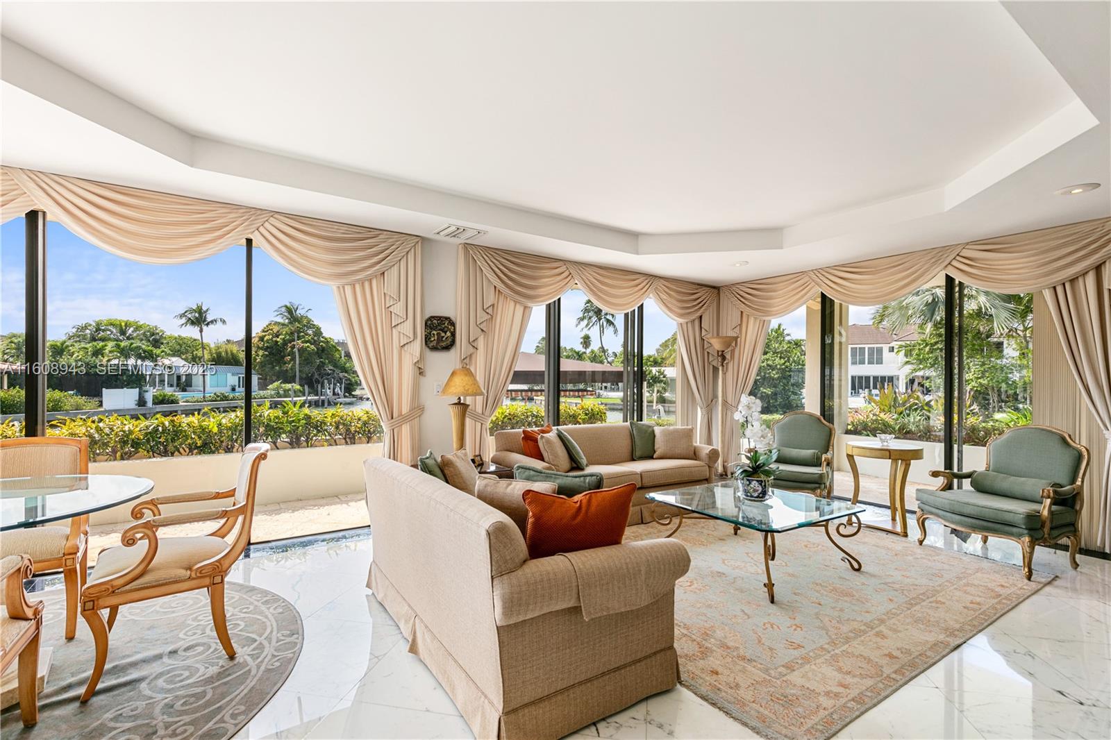 241 Cape Florida Drive Key Biscayne, FL 33149 - Photo 38 of 100 a living room with furniture and a large window