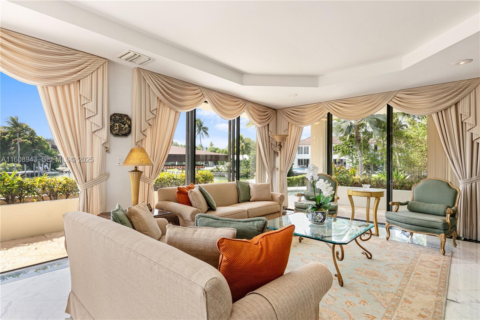 241 Cape Florida Drive Key Biscayne, FL 33149 - Photo 40 of 100 a living room with furniture and a large window