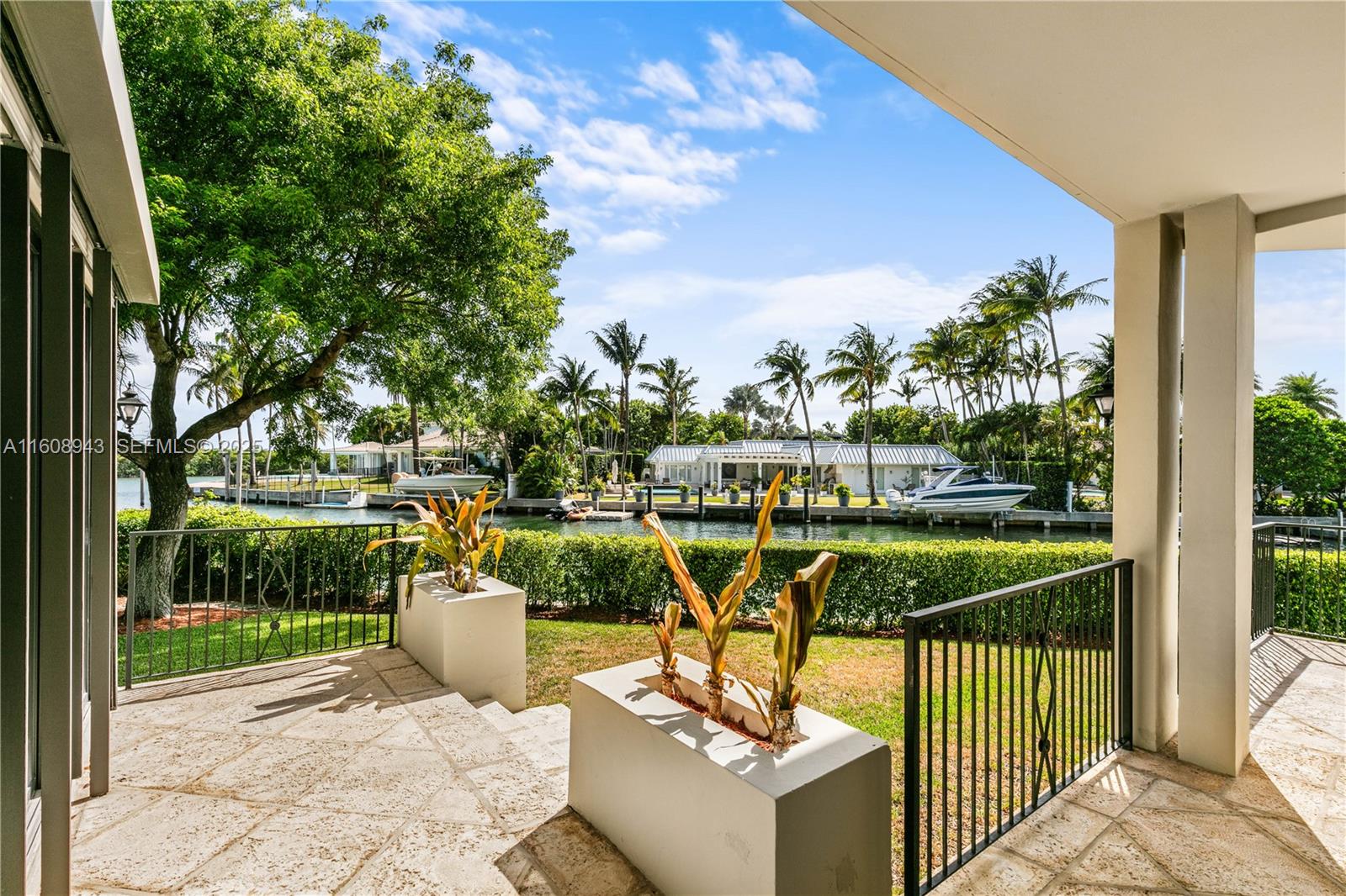 241 Cape Florida Drive Key Biscayne, FL 33149 - Photo 41 of 100 a view of a chair and tables in the balcony