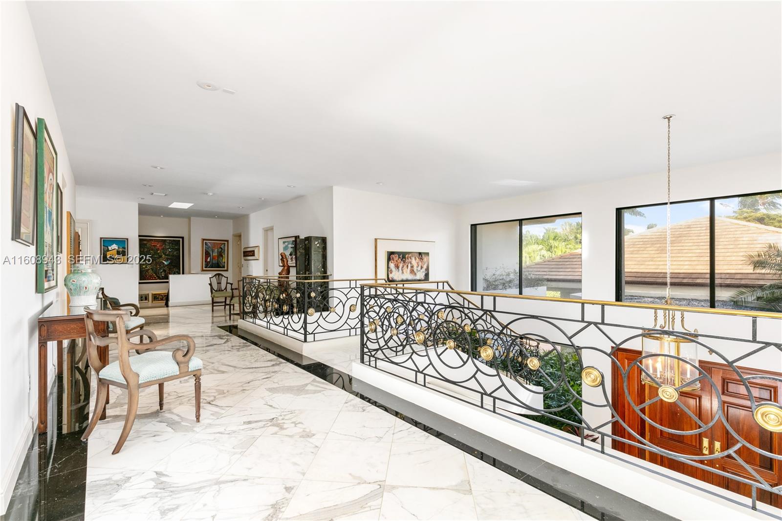 241 Cape Florida Drive Key Biscayne, FL 33149 - Photo 52 of 100 a living room with furniture and a table