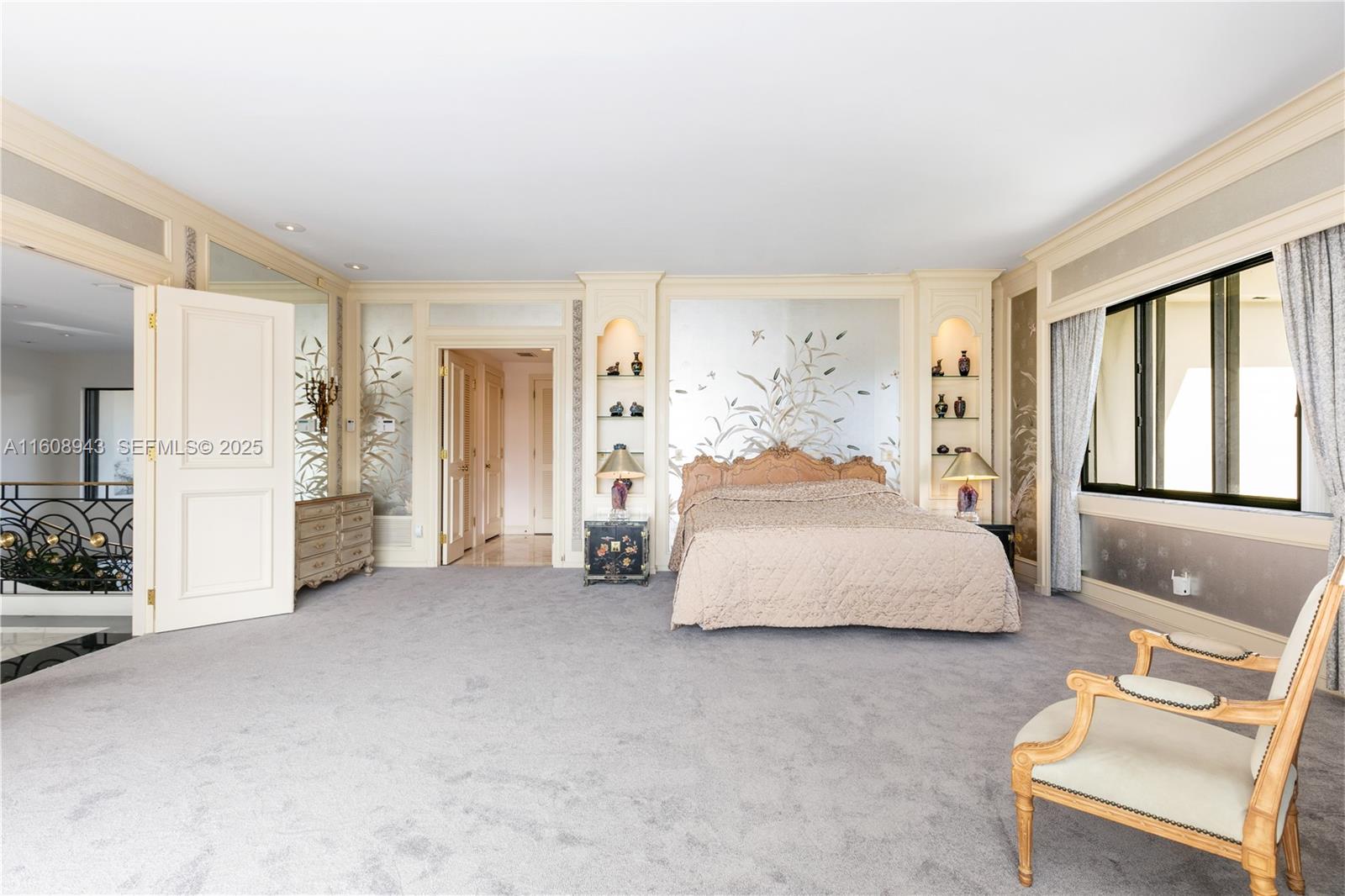 241 Cape Florida Drive Key Biscayne, FL 33149 - Photo 57 of 100 a spacious bedroom with a bed and cabinet