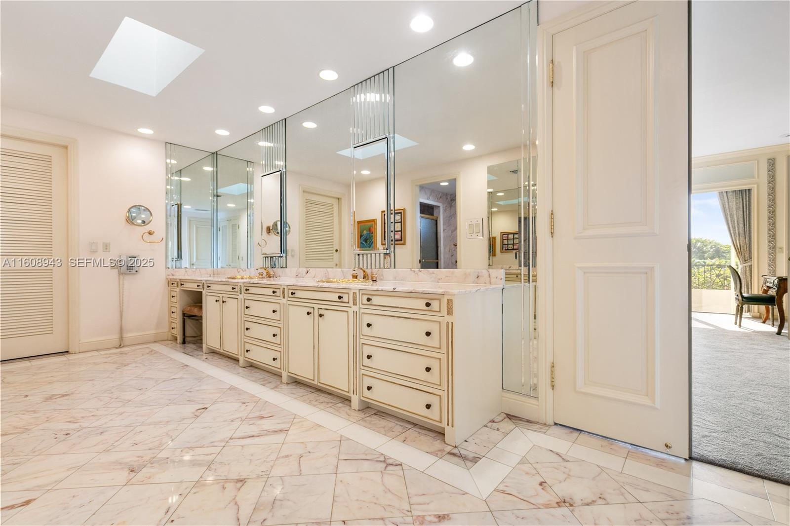 241 Cape Florida Drive Key Biscayne, FL 33149 - Photo 59 of 100 a bathroom with a double vanity sink mirror and shower