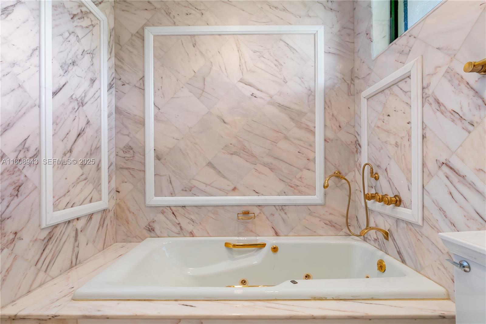 241 Cape Florida Drive Key Biscayne, FL 33149 - Photo 61 of 100 a white bath tub sitting next to a shower