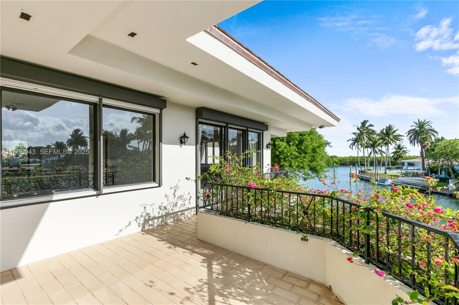 241 Cape Florida Drive Key Biscayne, FL 33149 - Photo 63 of 100 a view of a house with a balcony