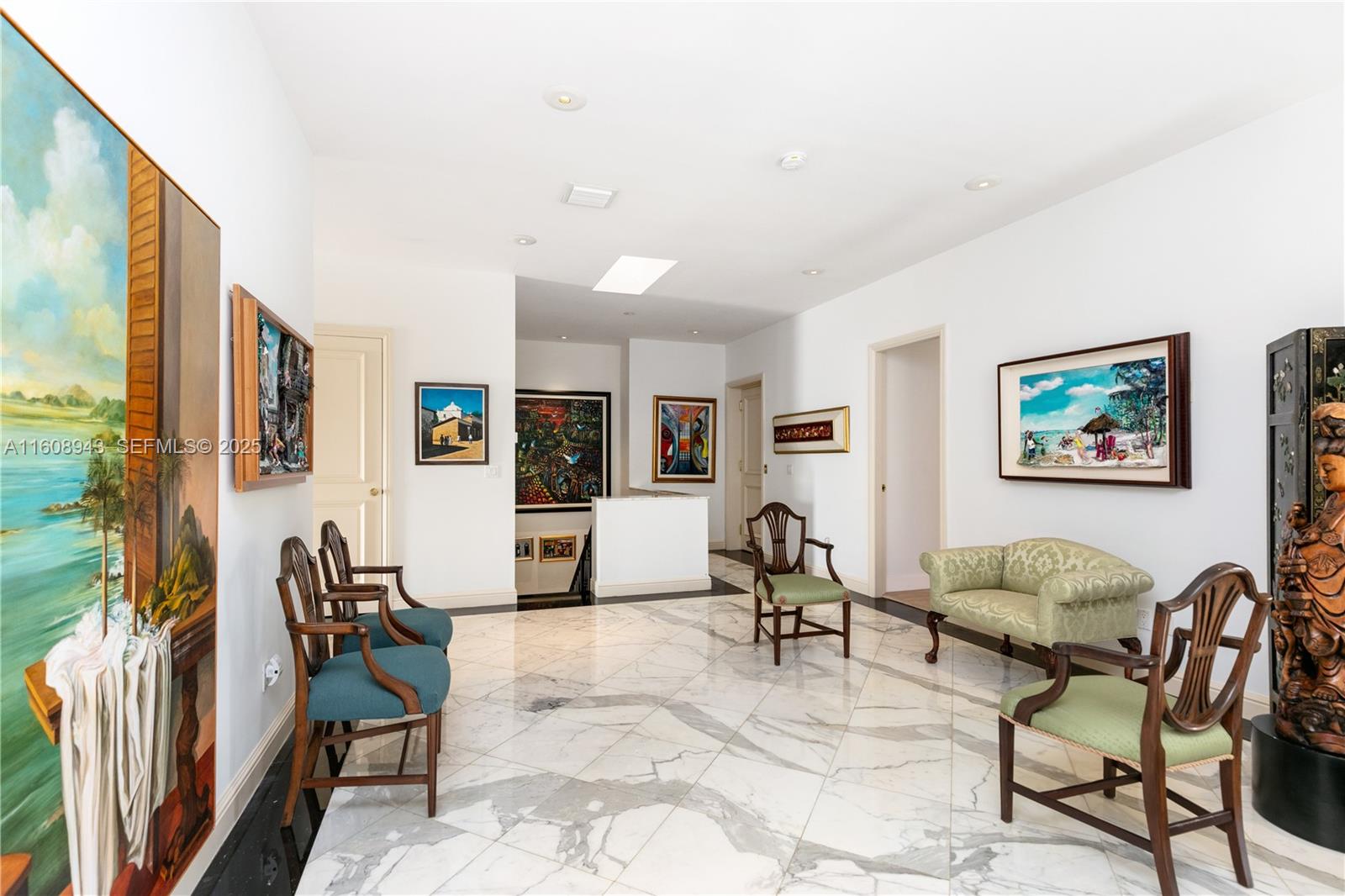 241 Cape Florida Drive Key Biscayne, FL 33149 - Photo 64 of 100 a living room with furniture and a flat screen tv