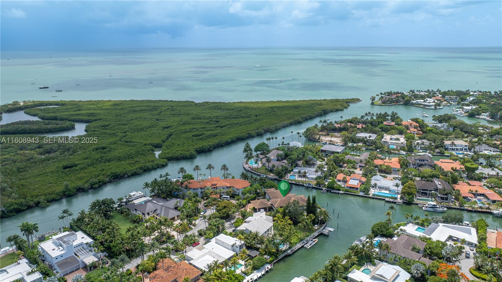 241 Cape Florida Drive Key Biscayne, FL 33149 - Photo 87 of 100 a view of a lake with a houses