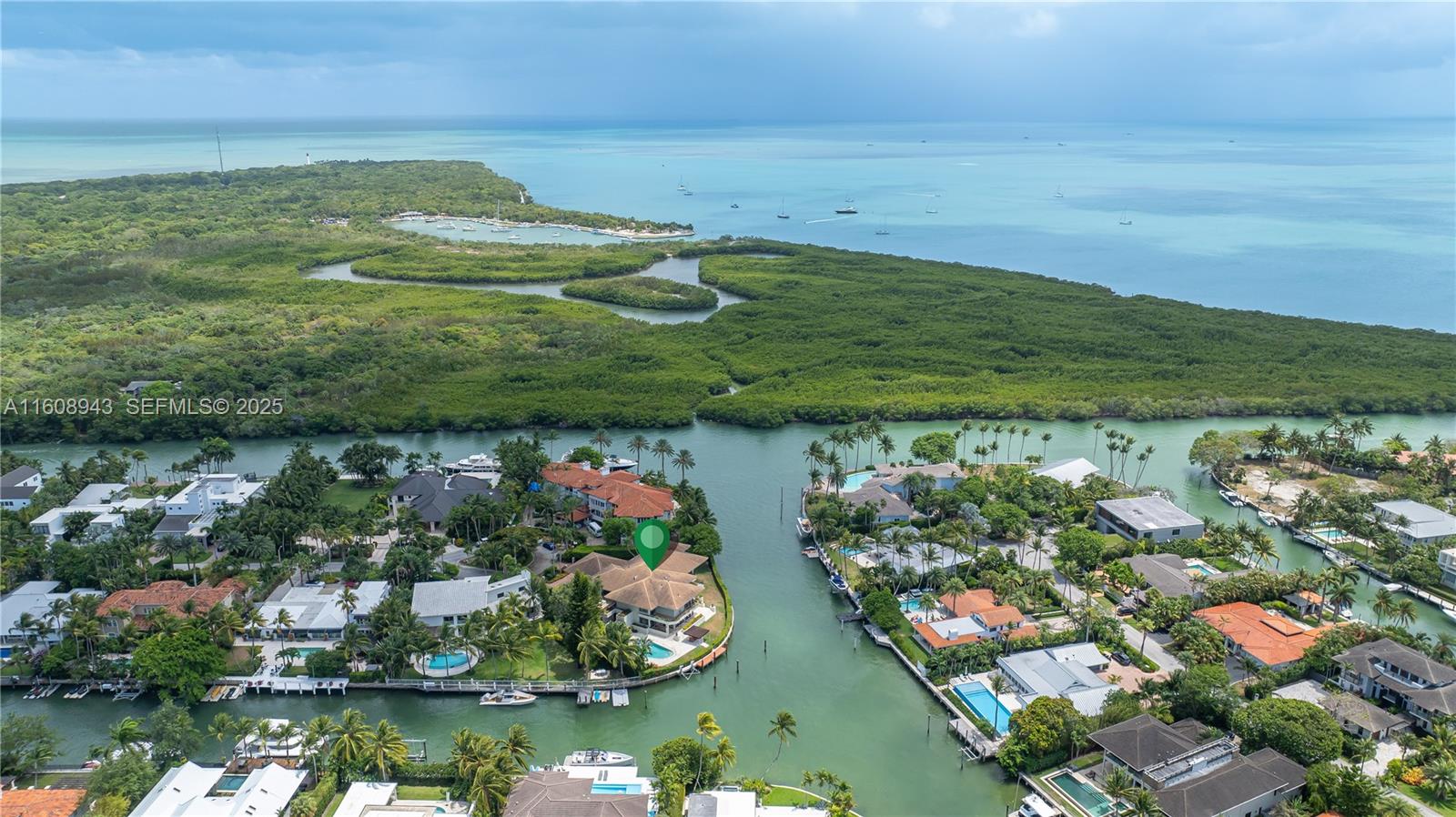 241 Cape Florida Drive Key Biscayne, FL 33149 - Photo 88 of 100 a view of a lake with a houses