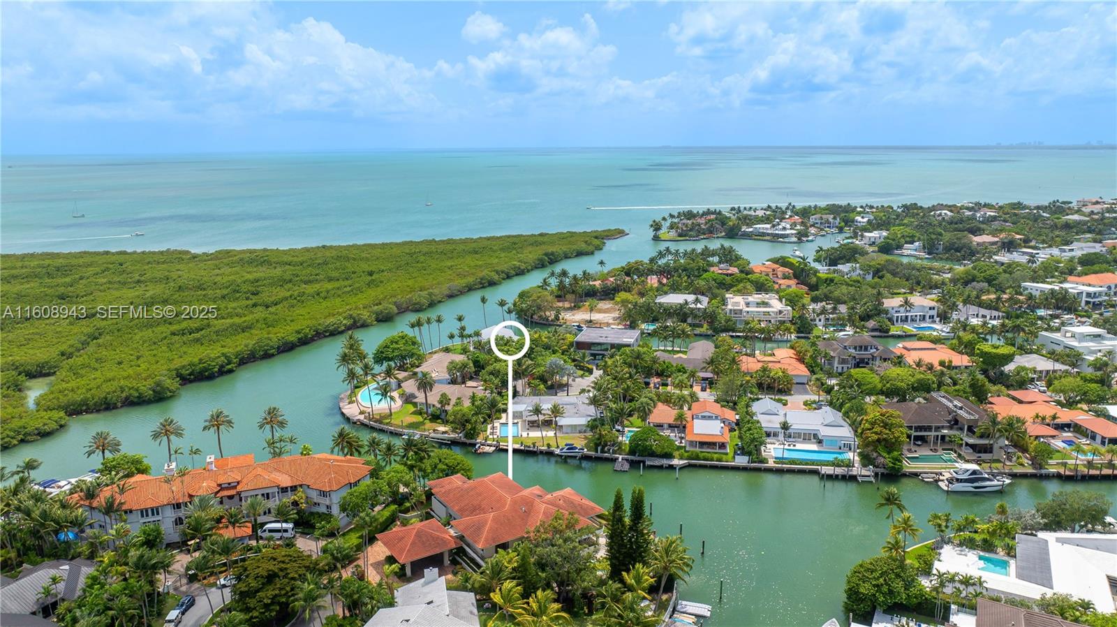 241 Cape Florida Drive Key Biscayne, FL 33149 - Photo 95 of 100 an aerial view of residential building and lake