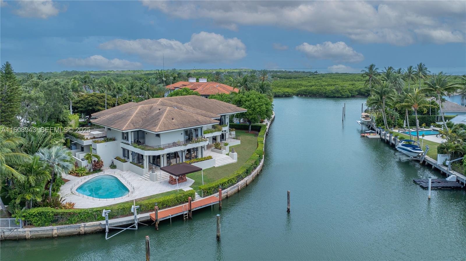 241 Cape Florida Drive Key Biscayne, FL 33149 - Photo 98 of 100 an aerial view of a house with outdoor space lake view and boat
