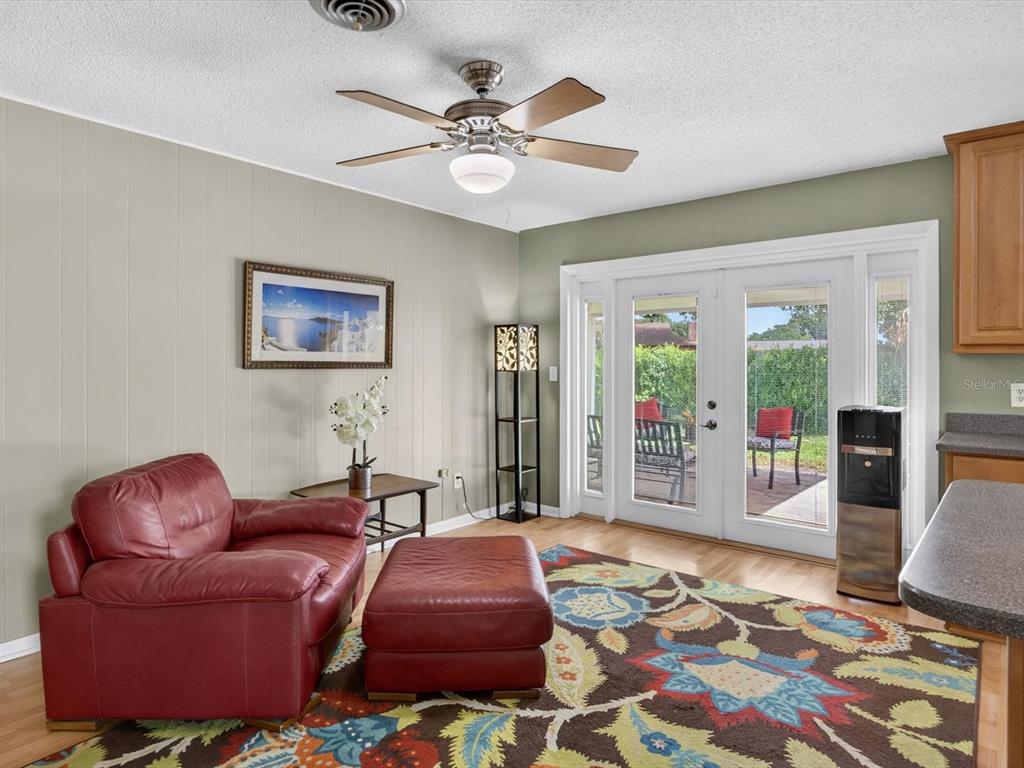 2803 Banchory Road Winter Park, FL 32792 - Photo 11 of 31 a living room with furniture and a rug
