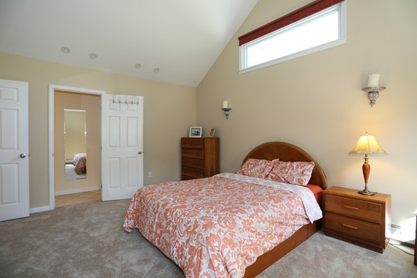3 E Road Wayland, MA 01778 - Photo 19 of 24 a bedroom with a bed and a lamp