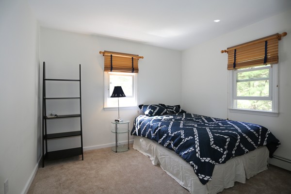 3 E Road Wayland, MA 01778 - Photo 21 of 24 a bedroom with a bed and a window