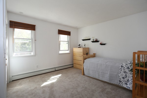 3 E Road Wayland, MA 01778 - Photo 23 of 24 a bedroom with a bed and a window