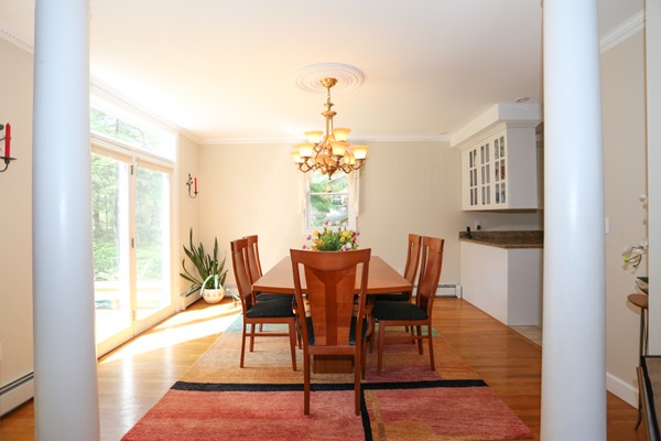 3 E Road Wayland, MA 01778 - Photo 7 of 24 a view of a dining room with furniture window and wooden floor
