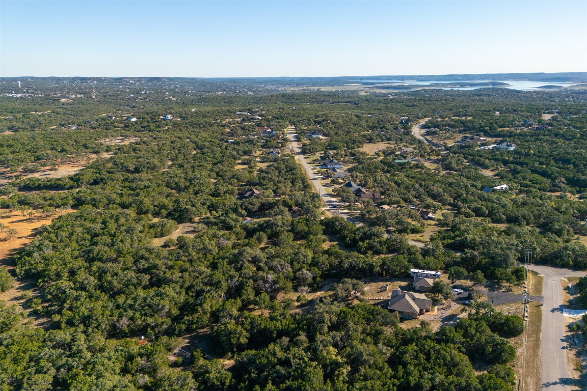 1101 Madrone Road Fischer, TX 78623 - Photo 11 of 20 an aerial view of residential houses with outdoor and green space