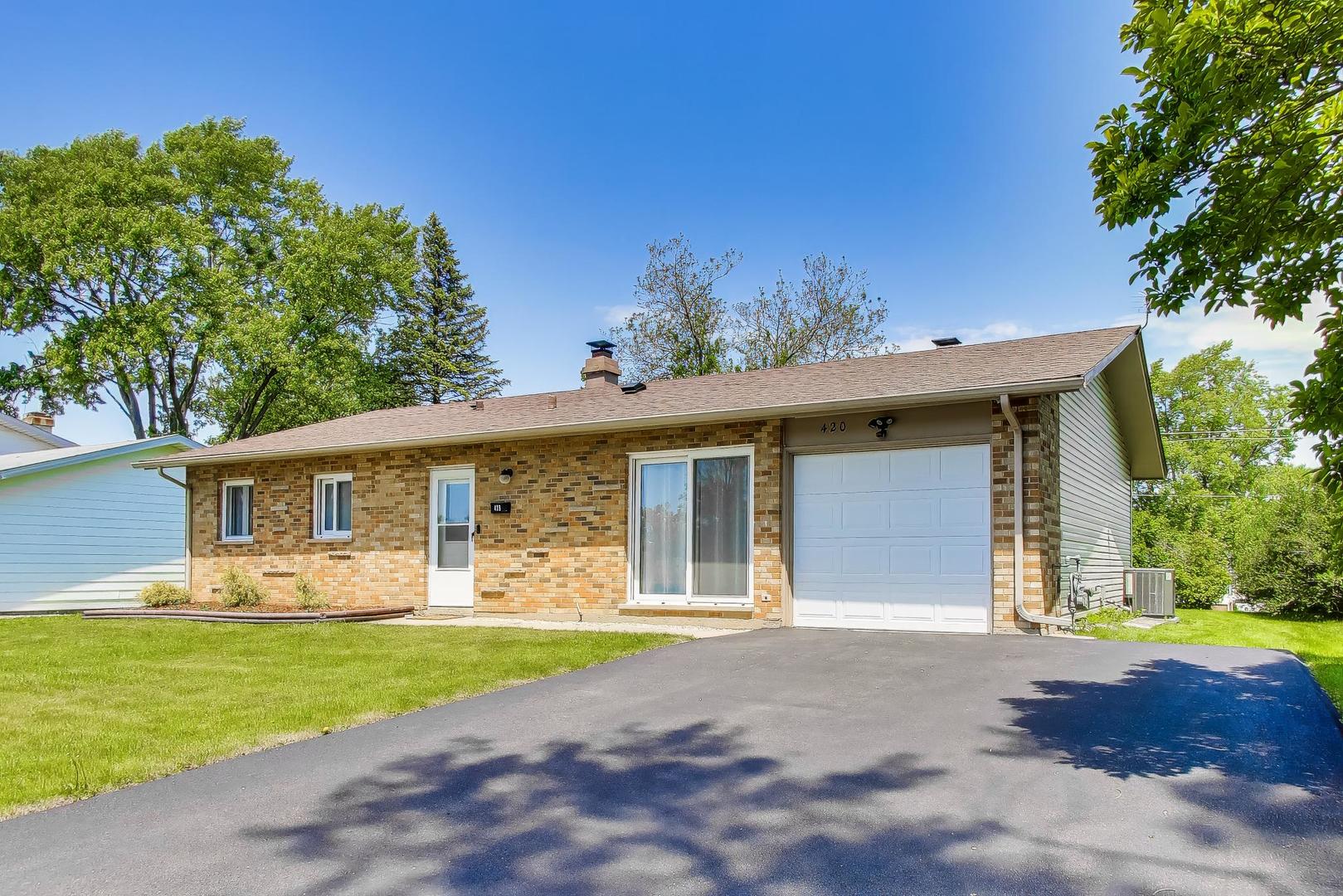 420 Bode Road Hoffman Estates, IL 60169 - Photo 2 of 20 a front view of house with yard and green space