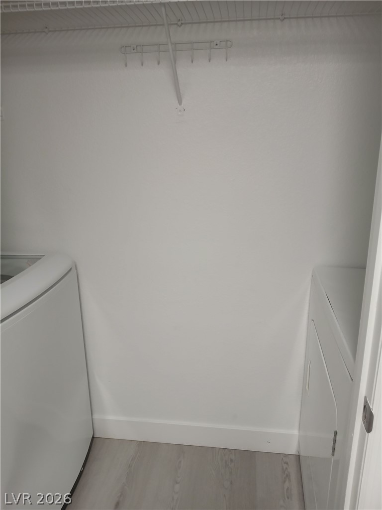 555 East Silverado Ranch Boulevard, Unit 1098 Las Vegas, NV 89183 - Photo 8 of 10 Functional laundry closet provides convenient space for appliances and storage.