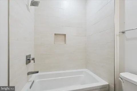 a bathroom with a bathtub