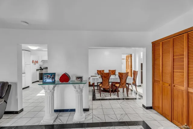 a view of a living room and dining room